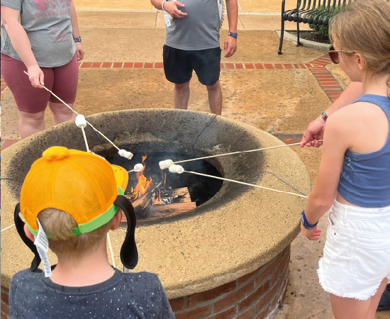 Roasting Marshmallows over a campfire at Disney's Port Orleans French Quarter
