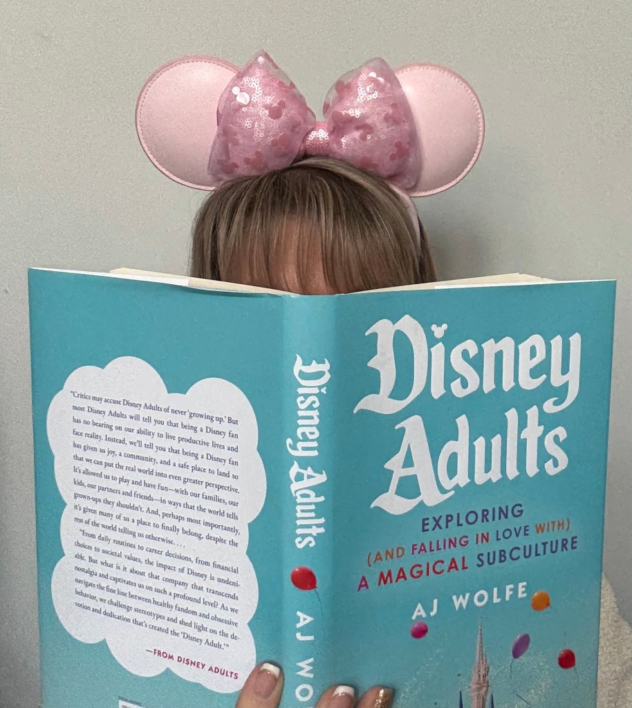 Just a Disney Adult reading Disney Adults by AJ Wolfe